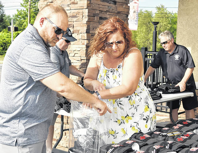 <p>Wyoming Area Kiwanis Club members prepare rifle-proof vests and first aid kits prior to area police and first responders picking them up on June 23. Left to right, front row: Dave Barnousky, Jacki Kasa. Back row: Kevin Murphy, Bob Orlando.</p>
<p>Tony Callaio | For Sunday Dispatch</p>