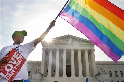 125246980_web1_gaymarriage
Carlos McKnight, of Washington, waves a flag in support of gay marriage outside of the Supreme Court in Washington, D.C. on Friday June 26, 2015. On that day five years ago, a 5–4 decision by the U.S. Supreme Court upheld same-sex marriage nationwide.
AP file photo