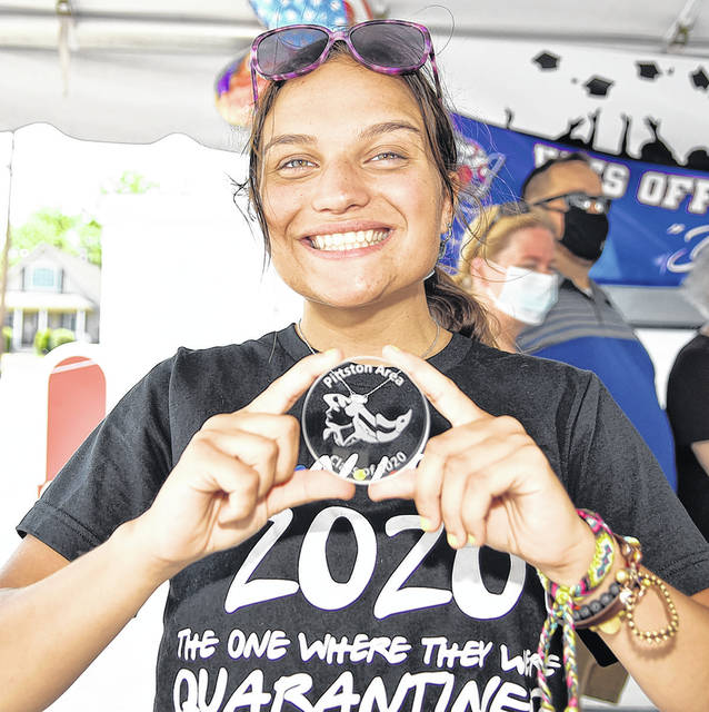 <p>Olivia Norwillo, a Pittston Area 2020 graduate, shows off her special gift donated by SCHOTT of North America Inc.</p>
<p>Tony Callaio | For Sunday Dispatch</p>