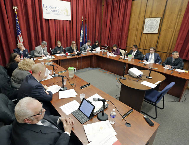 125320246_web1_LuzCountyCouncil-2
Luzerne County Council members, shown meeting at the county courthouse before the coronavirus, will continue meeting virtually next week but may hold an in-person meeting at the Luzerne County Community College later this month.
Times Leader file photo