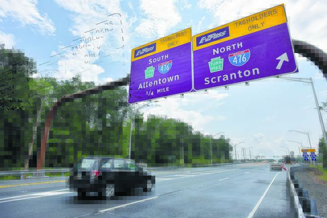 125368555_web1_turnpike01-cmyk
A vehicle drives under signs on the Northeast Extension of the Pennsylvania Turnpike in Penn Forest Township in Carbon County. Turnpike officials have announced yet another toll increase 6% beginning early next year as well as a new 45% surcharge for non-EZ-Pass users whose tolls are assessed by mail based on their license plates.
Times Leader file photo