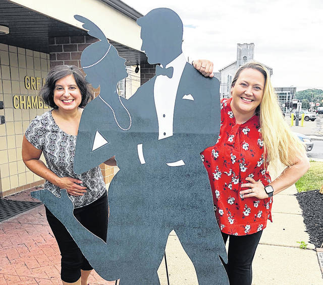 125387486_web1_GP-Chamber-100th-Dinner
Michelle Mikitish, Greater Pittston Chamber of Commerce executive director, and Brandi Bartush, Chamber administrator/events coordinator, pose with a Roaring 20s silhouette, reminding everyone the postponed 100th anniversary celebration scheduled this past June has been rescheduled to April 17, 2021. Check the Chamber website for details.
Tony Callaio | For Sunday Dispatch