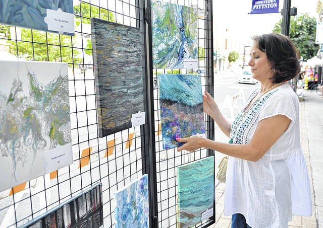 125463235_web1_August-Art-Walk-1
Artist Karen Styron Stocknick will have her original art pieces on the display, along with her custom made jewelry for the August 2nd Friday Art Walk in downtown Pittston.
Tony Callaio file photo