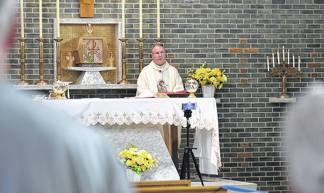 <p>Few attend daily Mass at the Oblates of St. Joseph Seminary while practicing social distancing and mask-wearing.</p>
<p>Tony Callaio | For Sunday Dispatch</p>