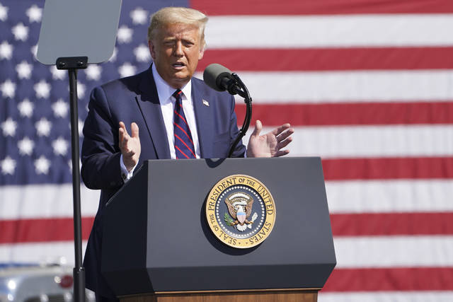 <p>President Donald Trump speaks during a campaign rally at Mariotti Building Products on Thursday in Old Forge.</p>
<p>John Minchillo | AP photo</p>