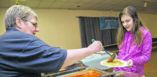 
			
				                                Diane Koonrad of Kingston serves spaghetti to Mary Ann Stout, 10 of Edwardsville during a fundraiser event for Breathe Deep NEPA in 2018. The group will host a fundraising spaghetti dinner this Sunday, Sept. 27 from noon to 4 p.m. at Bernardine Hall, 13 Hudson Road, Plains Township.
                                 Times Leader file photo

			
		
