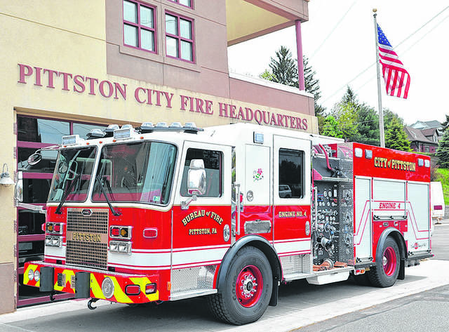 125804327_web1_Pittston-City-Engine-4-1
A rescue and fire engine is seen outside Pittston City Fire Headquarters earlier this year. The department is one of several in Luzerne County which will share $1,844,365 in COVID-19 relief funds, the Pennsylvania Office of the State Fire Commissioner said Friday.
Times Leader file photo
