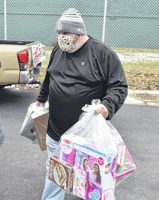 <p>Anthony Marranca, Santa Squad founder, is shown delivering bags of toys designated for more than 1,000 children in Greater Pittston and surrounding communities.</p>
<p>Tony Callaio | For Sunday Dispatch</p>