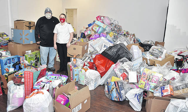 <p>Five truckloads of toys were received by Lt. Holly Yeatts of the West Pittston Salvation Army in time for their Angel Tree Program where 350 children will receive three to four toys each donated by the Greater Pittston Santa Squad toy drive. Shown is Anthony Marranca of the Santa Squad and Yeatts.</p>
<p>Tony Callaio | For Sunday Dispatch</p>