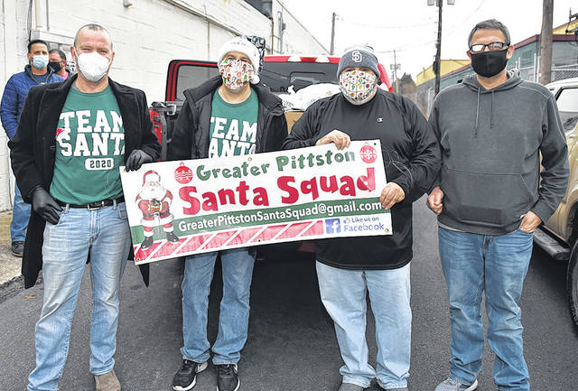 <p>The Greater Pittston Santa Squad, now in their third year, delivered five truckloads of toys to the Salvation Army. From the left are Pat Tracy, Gary Worsilla, founder Anthony Marranca and Chris Sheperis.</p>
<p>Tony Callaio | For Sunday Dispatch</p>