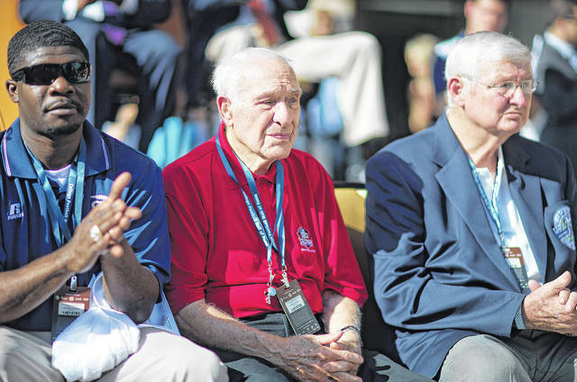 126182648_web1_AP876738335216
Former University of Georgia player Charley Trippi, center, is introduced at the grand opening ceremony for the College Football Hall of Fame in 2014, in Atlanta. Trippi, the oldest living member of the Pro Football Hall of Fame, turned 99 on Monday.
AP file photo