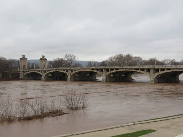 <p>The Susquehanna River flows fast and brown on Friday afternoon beneath the Market Street Bridge.</p>
<p>Roger DuPuis | Times Leader</p>