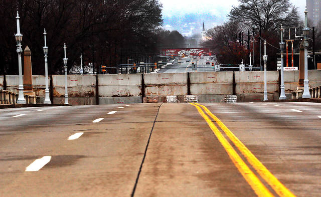 126215611_web1_flood_gate6_faa
Floodgates are seen installed looking toward Kingston on the Market Street Bridge, where they will remain until after the Susquehanna River crests this weekend.
Fred Adams | For Times Leader