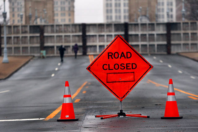 <p>A ‘road closed’ sign is seen on Market Street before the bridge on the Kingston side on Christmas Day because of the installation of floodgates.</p>
<p>Fred Adams | For Times Leader</p>