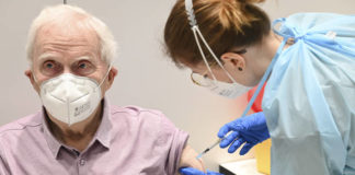 
			
				                                Richard Kilian from Wiesbaden-Schierstein is vaccinated with the Biontech/Pfizer vaccine by Fenna Martin at the vaccination center in the RMCC convention center in Wiesbaden, Germany on Tuesday. Here in Pennsylvania, those 65 and older and those younger who have serious medical conditions are now eligible for vaccination.
                                 Arne Dedert | dpa via AP

			
		