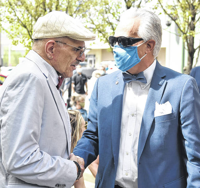 126938913_web1_James-Musto-Park-6
James A. Mustos nephew Joe Montione, left, and grandson Raphael A. Musto, exchange congratulations at the completion of the dedication of the Hon. James A. Musto, Greater Pittston Miner and Garment Worker Memorial Park.