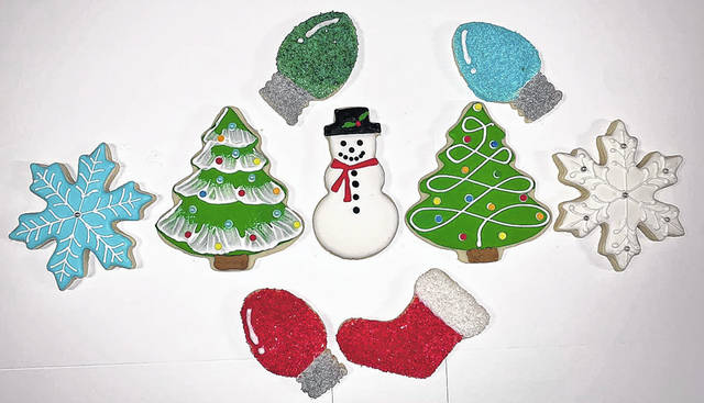 <p>Christina Kasa Russo takes pride in her artistry in designing cookies for all occasions.</p>
<p>Tony Callaio | For Sunday Dispatch</p>