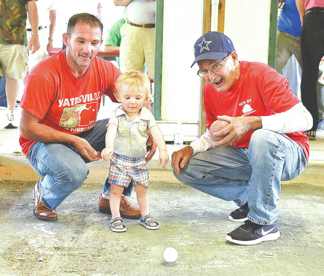 <p>Three generations of Guidon DePascales gather for the ceremonial first toss of the 2021 season. From the left, Little Guy, Guy III, Guy Sr.</p>
<p>Tony Callaio | For Sunday Dispatch </p>