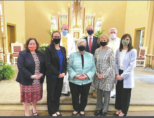 <p>Row 1: Ms. Danielle Rake, Director of Enrollment and Marketing D.O.S, Mrs. Melissa Skutack, principal Holy Rosary School, Ms. Kathy Gilmartin, Assistant Superintendent D.O.S., Mrs. Michele Long, Assistant Superintendent D.O.S., Mrs. Kristen Donahue,Superintendent D.O.S.; Row 2: Monsignor Tressler, Mr. Jason Morrison, Diocesan Secretary and Chief Executive Officer D.O.S., Rev. John Polednak, Nativity of Our Lord Parish, Duryea.</p>
<p>Submitted photo</p>