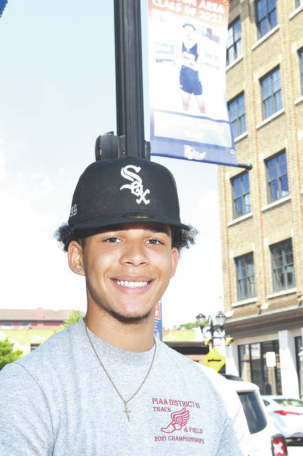 <p>Senior Anthony Thomas, of Jenkins Township, who excelled at track and played football for the Patriots, was on hand for the parade. Thomas will attend Bloomsburg University in the fall.</p>
<p>Tony Callaio | For Sunday Dispatch</p>