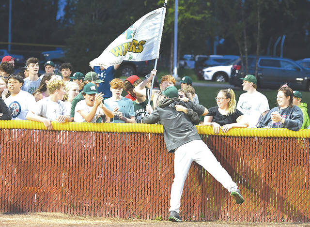 <p>Wyoming Area head coach Rob Lemoncelli is embraced by Warrior fans at the end of the game against Bonner/Prendergast Catholic.</p>
<p>Tony Callaio | For Times Leader</p>