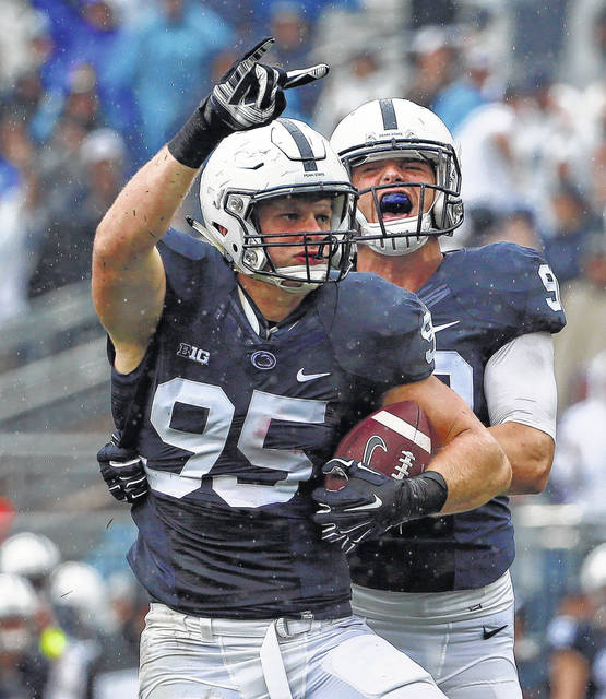 127226714_web1_nassib-sickels
Penn State defensive end Carl Nassib (95) celebrates his second half interception with defensive end Garrett Sickels (90) during an NCAA college football game against Buffalo in State College, Pa., Saturday, Sept. 12, 2015.
AP file photo