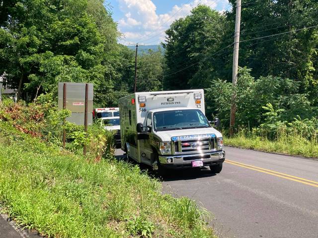 <p>Emergency crews are seen heading to the site of a dog rescue in Pittston Township on Wednesday.</p>
<p>Kevin Carroll | Times Leader</p>
