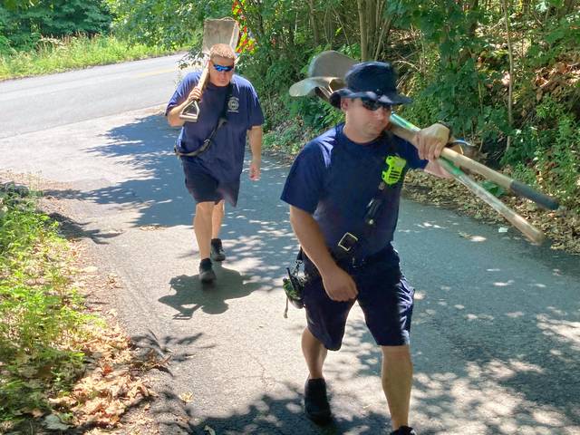127233709_web1_205766885_838026623485322_2620365584741719917_n
Emergency crews are seen heading to the site of a dog rescue in Pittston Township on Wednesday.
Kevin Carroll | Times Leader