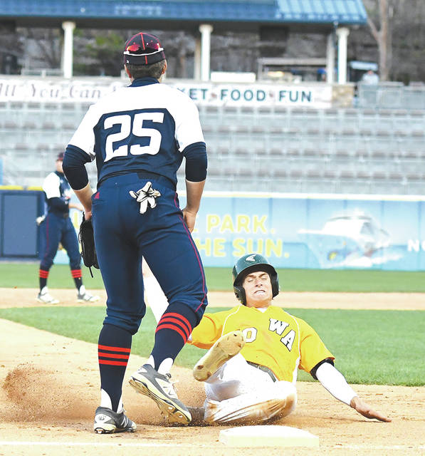 <p>Marc Anthony Minichello slides into third base on a fielder’s choice against Pittston Area at PNC Field during his junior year in high school.</p>
<p>Tony Callaio file photo</p>