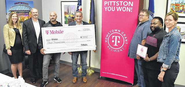 127659068_web1_T-Mobile-Donation-Pittston-1
T-Mobile, through their Hometown Grant program, donated $15,000 to the City of Pittston. Left to right: Shannon Bonacci, Pittston Redevelopment Authority, Joe Chacke, Pittston Redevelopment Authority executive director, Joe Giannone, T-Mobile senior manager, Pittston Mayor Michael Lombardo, Joe Chernouskas, Pittston Redevelopment Authority board member, Kevin Pierre, T-Mobile rural marketing manager, Mary Kroptavich, Pittston Main Street manager.
Tony Callaio | For Times Leader