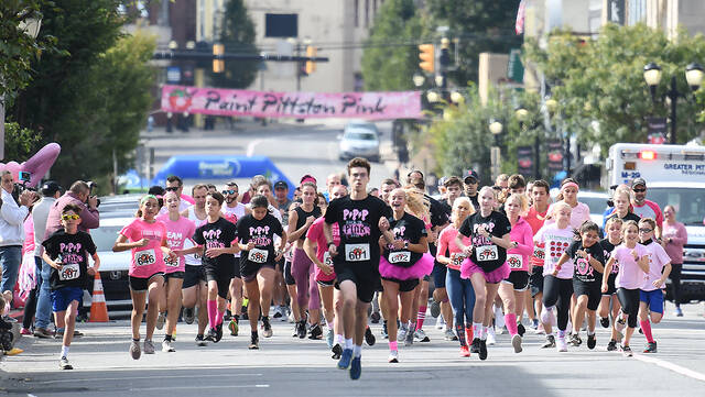 127695934_web1_PPP-5K-Gentlemen-s-Dash-1
Eventual winner of the Color Me Pink 5K Paint Pittston Pink race, Preston Klem, Dupont, leads the pack at the start of the race on Main Street, Pittston, Saturday morning.
Tony Callaio | For Times Leader