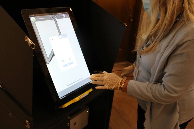 127708532_web1_IMG_0914
One of Luzerne Countys electronic voting machines is seen being demonstrated last fall in this file photo. County officials have vowed to do their best to pull off a problem-free election next month by methodically staying on top of preparations.
Times Leader file photo