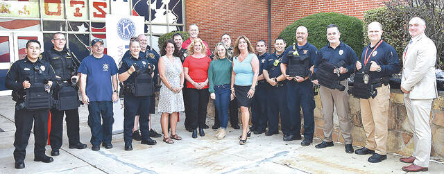 127758998_web1_WA-Kiwanis-Vest-Donations-4-copy
Wyoming Area Kwianis Club donated 16 rifle-proof vests, with the aid of a $3,000 check donated by Northest Window Inc. and Smith & Miller Roofing, to EMS members from Pittston Township, Jenkins Township, Duryea, Pittston City, Hughestown and Avoca. Shown in the photo are representatives from those mentioned municipalities, along with Pittston Area School District, WAKC, and the Rogo family representing the two businesses.
Tony Callaio | For Sunday Dispatch