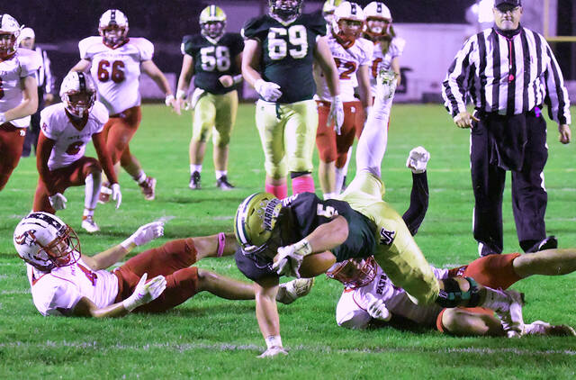 <p>Wyoming Area’s Aaron Crossley dives into the end zone to finish off his 15-yard touchdown run in the first quarter Friday night.</p>
<p>Tony Callaio | For Times Leader</p>