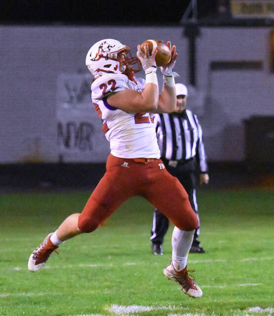 <p>Pittston Area’s Drew Menendez (22) catches a ball in the flat for extra yardage against Wyoming Area on Friday night.</p>
<p>Tony Callaio | For Times Leader</p>
