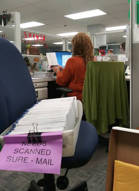 127849663_web1_ballotscan
A Luzerne County worker scanned in mail ballots last week to record them as received. As of 6 p.m. on Election Day, voters had returned 71.1% of the requested ballots to the county.
File photo