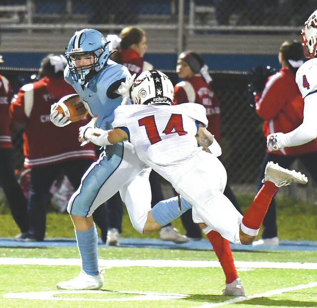 <p>Sophomore Zach Paczewski (3) breaks free from Pittston Area’s Gino Triboski (14) for a 89-yard touchdown reception for the Mountaineers.</p>
<p>Tony Callaio | For Times Leader </p>
