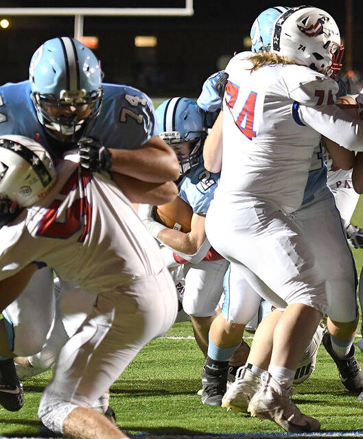 <p>Dallas Area running back Parker Bolesta (2) peeks through a gap two score a two-yard touchdown against Pittston Area.</p>
<p>Tony Callaio | For Times Leader </p>