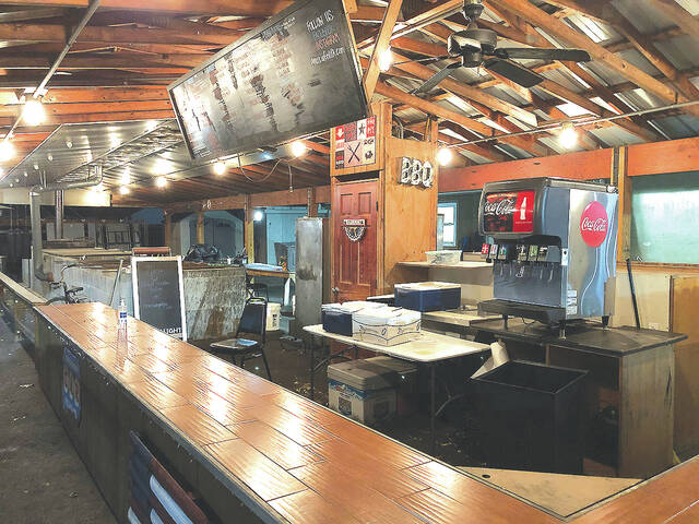 127892552_web1_American-Grill-BBQ-4-copy
The service area, bar and smokers are just feet away from the large pavilion at the rear of The American Grill & BBQ.
Tony Callaio | For Sunday Dispatch