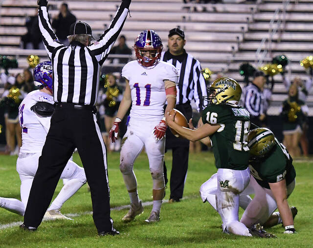 <p>Wyoming Area’s Nico Sciandra (16) scores on a 17-yard run in the second quarter.</p>
<p>Tony Callaio | For Times Leader</p>