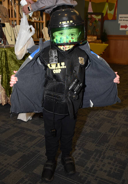 <p>Callen Smith, 5, decided to dress in his law enforcement uniform while participating in the Shop with a Cop program.</p>
<p>Tony Callaio | For Times Leader</p>