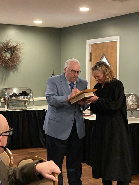 <p>Walter Griffith takes the oath of office for Luzerne County Controller administered by county Court of Common Pleas Judge Lesa S. Gelb at Leggio’s Italian Restaurant in Dallas Monday night.</p>
<p>Submitted photos</p>