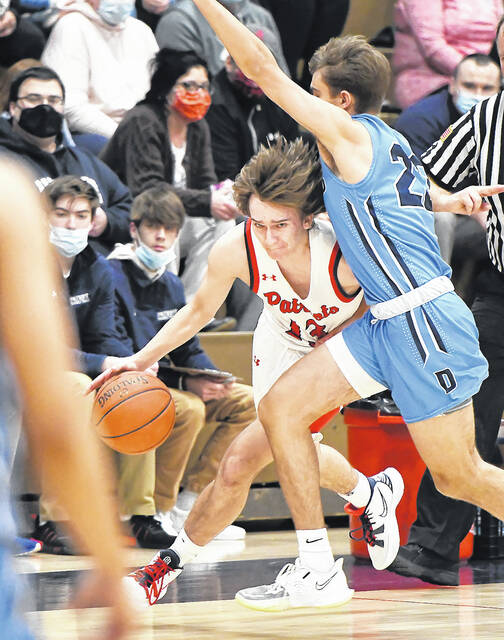 <p>The Patriots’ JJ Walsh (13) dribbles his way around Dallas Area’s EJ Matushek (22) during a Mountaineer full court press. </p>
<p>Tony Callaio | For Sunday Dispatch</p>