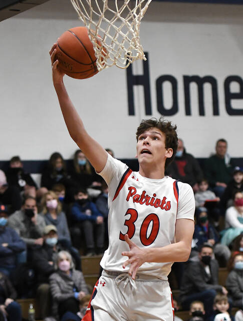 <p>Pittston Area’s Jack Locker scores on a easy layup against Abington Heights in a District 2 Class 5A semifinal game Friday night.</p>
<p>Tony Callaio | For Times Leader</p>