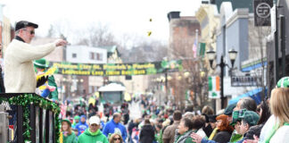 
			
				                                Jack Linskey stands atop the Jenkins Twp. float as he tosses candy out the the crowd.
                                 Tony Callaio | For Times Leader

			
		