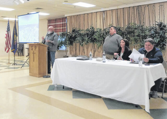 128364260_web1_whitehaven2
White Haven Borough Councilman Robert Lamson discusses the negative impacts of a state toll plan for Interstate 80 Thursday night, with fellow panelists, from left, borough Councilman John Zugarek, Luzerne County Councilwoman LeeAnn McDermott and County Acting Manager Romilda Crocamo.
Jennifer Learn-Andes|Times Leader