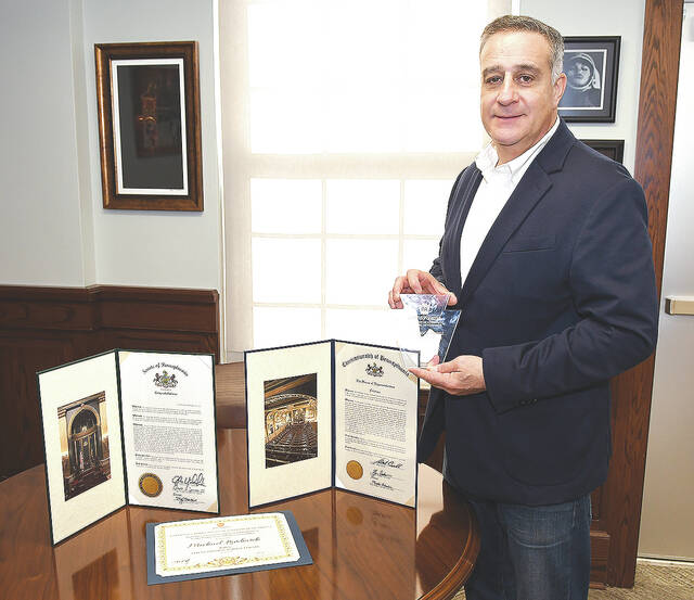 128416632_web1_Mayor-Lombardo-Award-1-copy
City of Pittston Mayor Michael Lombardo hold his award for leadership handed out by Governon Tom Wolf for the 2022 Governors Award for Local Government Excellence along with proclamations from State Sen. John Yudichak and State Rep. Michael Carrol.
Tony Callaio | For Sunday Dispatch