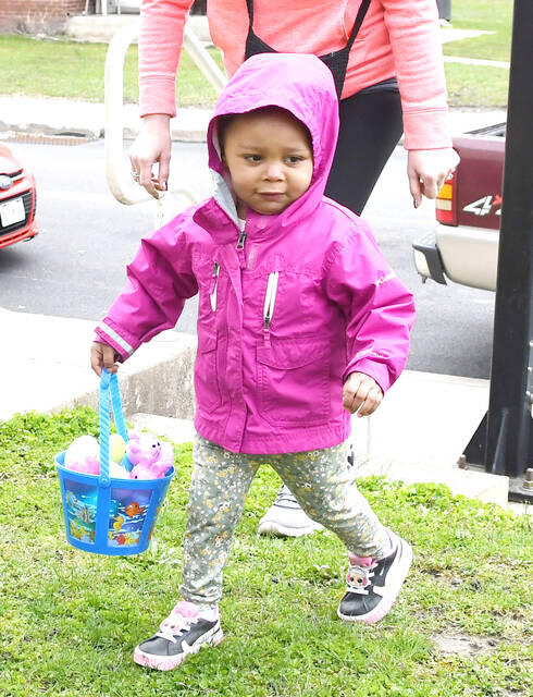 <p>Two-year-old Londyn Brake, escorted by her grandmother, Leslie Williams, was pretty successful doing the Easter Egg Hunt on Panama Street, Pittston.</p>
<p>Tony Callaio | For Sunday Dispatch</p>