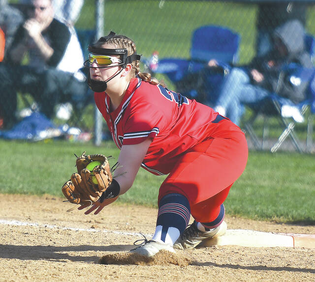 <p>Patriot first baseman, Taylor Baiera, stretches low after a toss from Pittston Area shortstop Bella Giardina for the out.</p>
<p>Tony Callaio | For Sunday Dispatch</p>