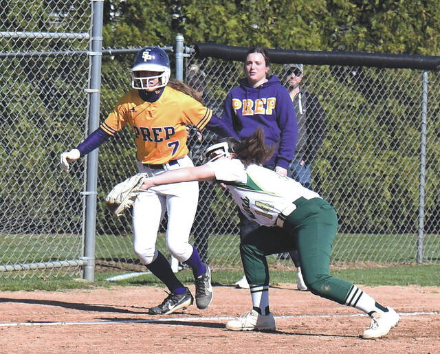 128441438_web1_WA-Prep-GSB-1-copy
Wyoming Area 3rd baseman Marissa Giadina (14) catches a line drive to keep Scranton Preps Maria Belardi (7) at third base.
Tony Callaio | For Sunday Dispatch